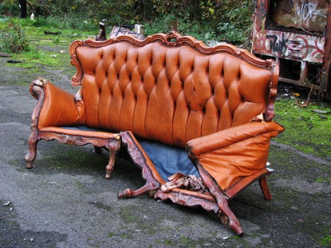 White van from insured waste company parked with secure load