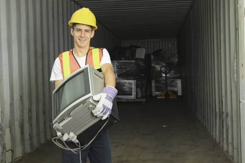Inspector reviewing waste transfer records during an investigation